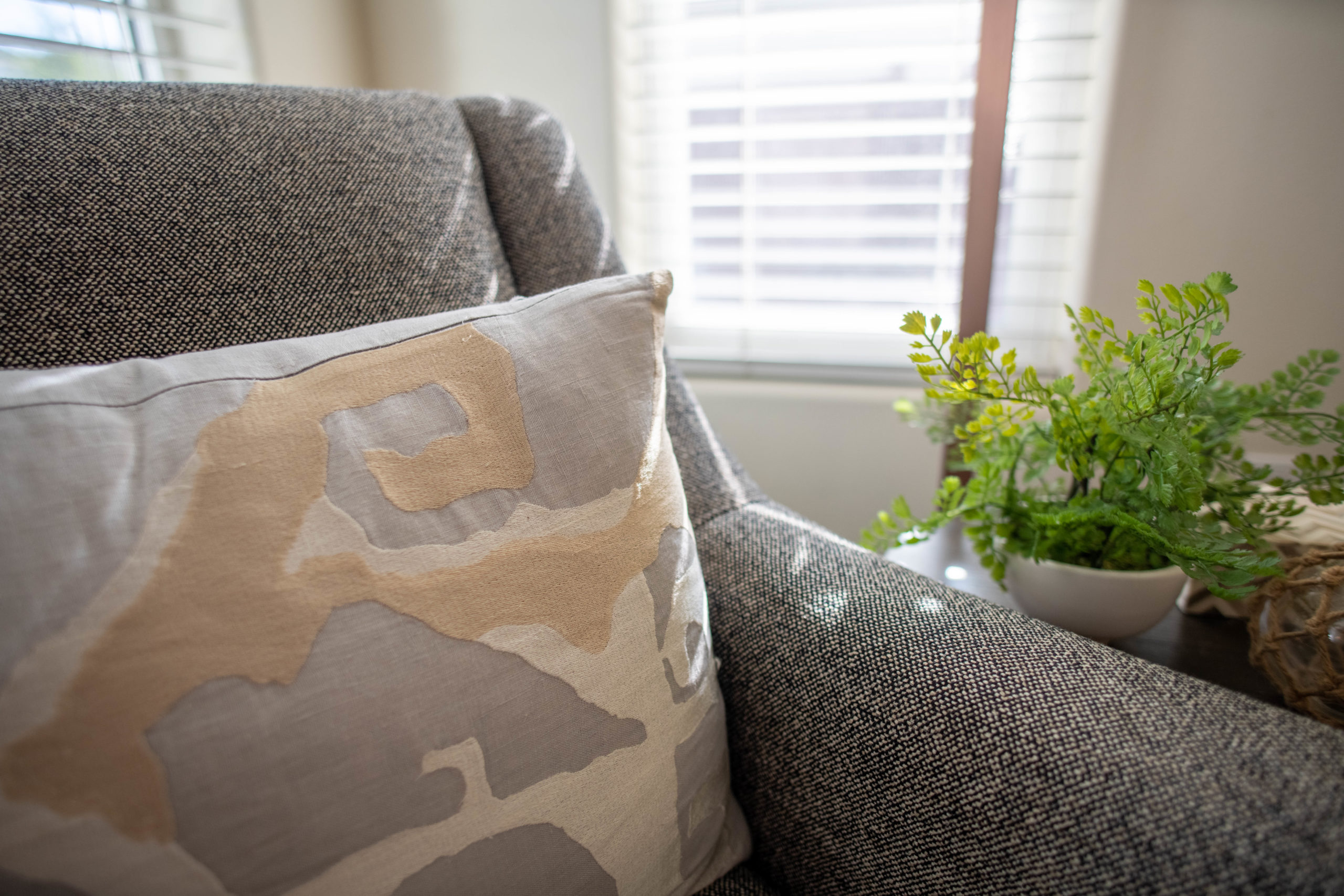 close up of chair with pillow on it