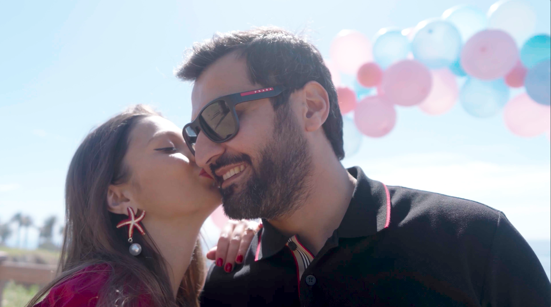 woman kissing man on cheek